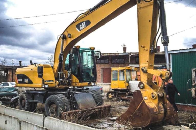 Колесный экскаватор Caterpillar M318D