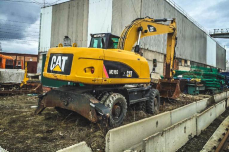 Колесный экскаватор Caterpillar M318D