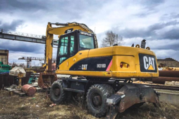 Колесный экскаватор Caterpillar M318D
